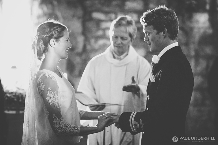 Bride and groom exchange rings