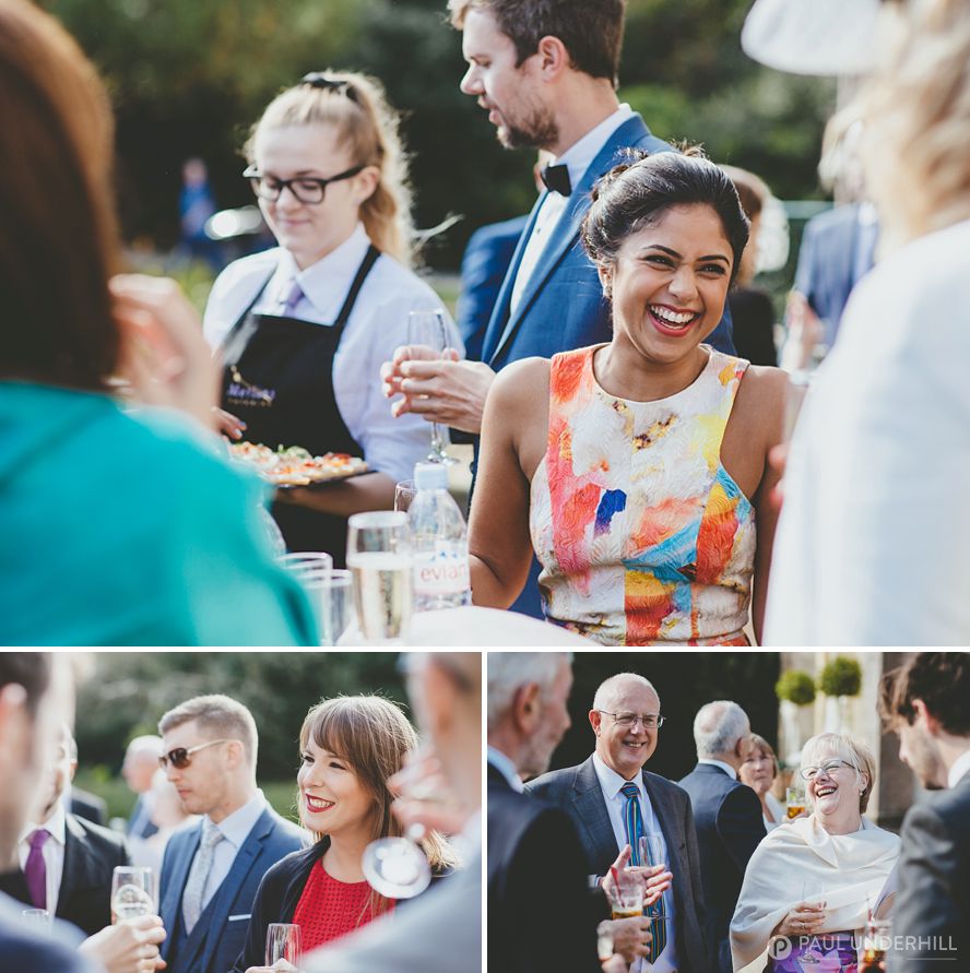 Guests laughing Highcliffe Castle wedding